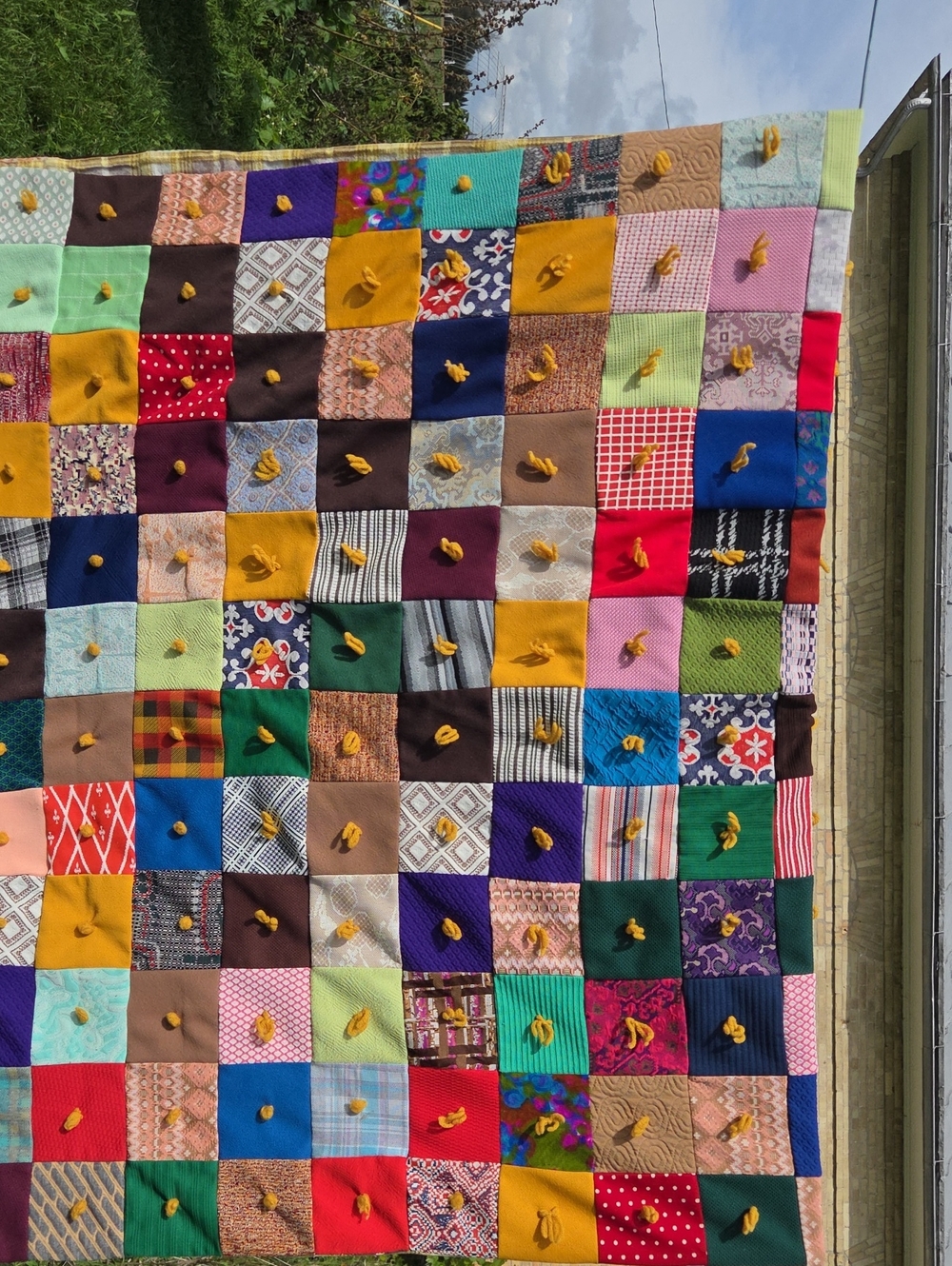 Handmade Multicolor Patchwork Quilt with Mustard Tuft Accents